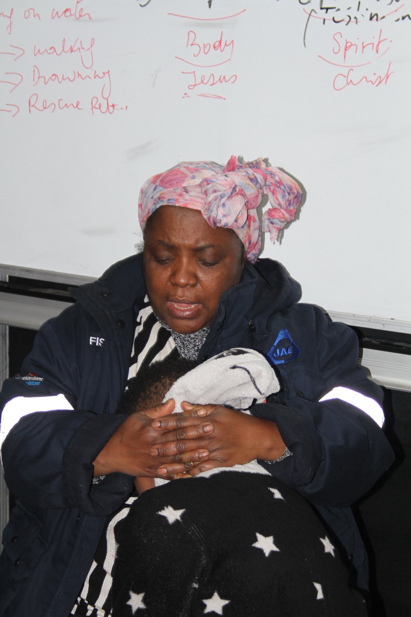 Pastor leading prayer
